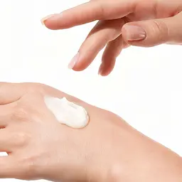 Cream on a hand